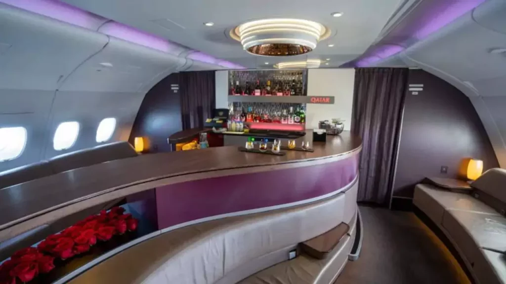 Does Qatar Airways serve alcohol in business class?